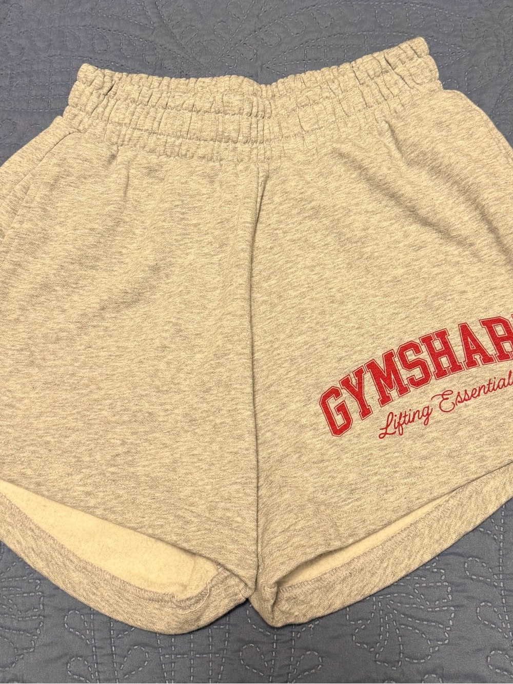 Gymshark Light Gray Athletic Lounge Shorts with Red Logo